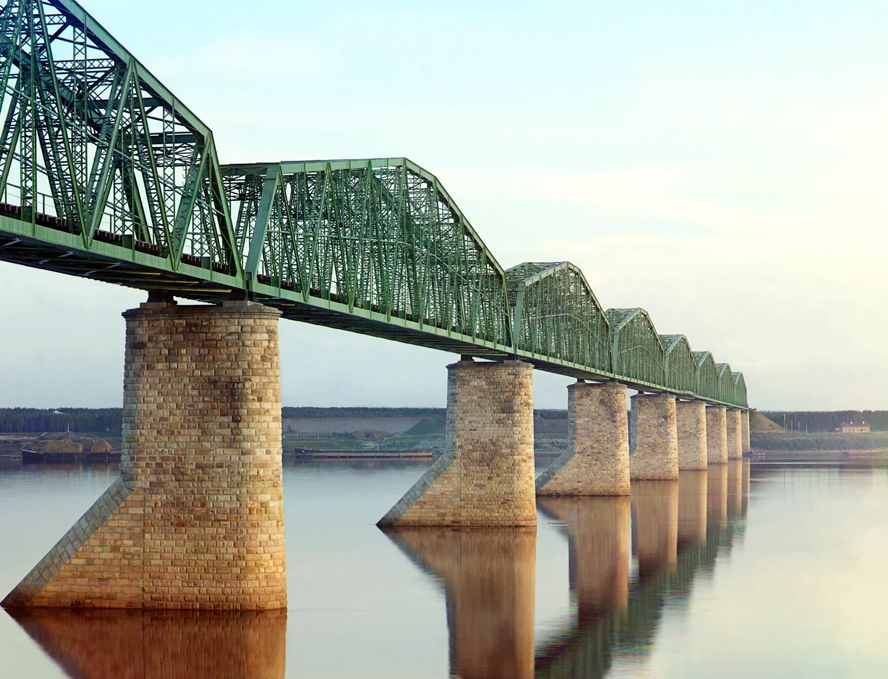 The Trans-Siberian bridge over the Kama in Prokudin-Gorsky’s early color photograph (1900s–1910s): the material fabric of the ties — European equipment, European capital, Russian iron.